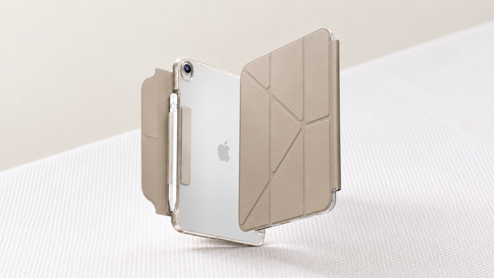 Silver iPad with beige folding case, clear back and pencil holder